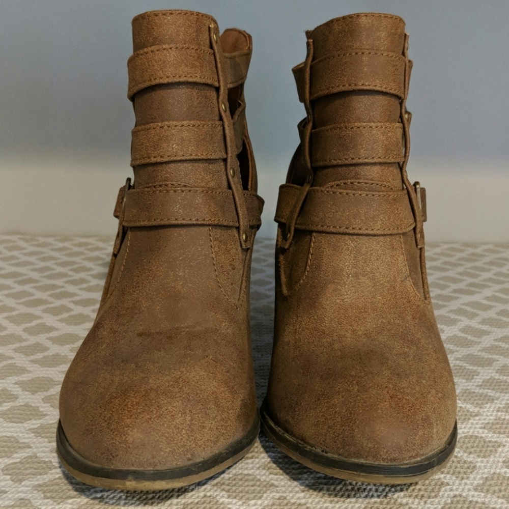 Brown heeled booties with straps